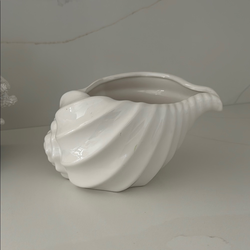 Elegant White Shell-Shaped Ceramic accessory.  Color white.
